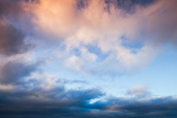 Naklejka na ściany i meble Colorful clouds in morning sky, background