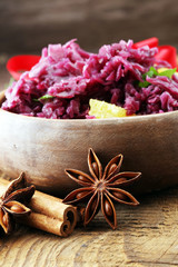 Red Cabbage salad with orange and pecan nuts for Christmas dinner. Vegetarian dish