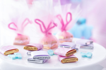 Stand with baby shower favors