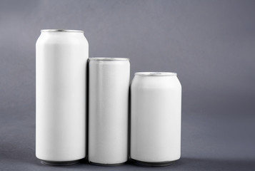 Tin cans on grey background