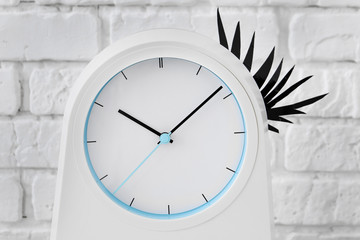 Clock with eyelashes, close up
