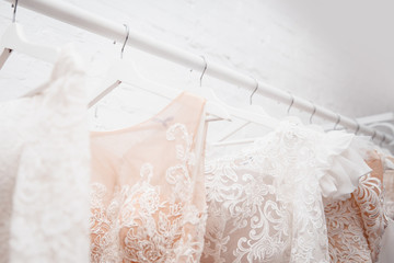 Wedding dresses for bride in store. Concept wedding, engagement.