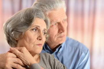 Sad senior couple