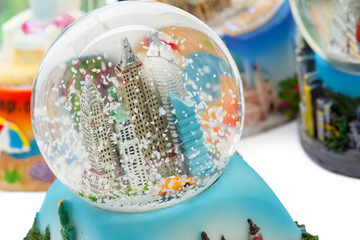 Snow globe travel souvenier destination isolated on white background