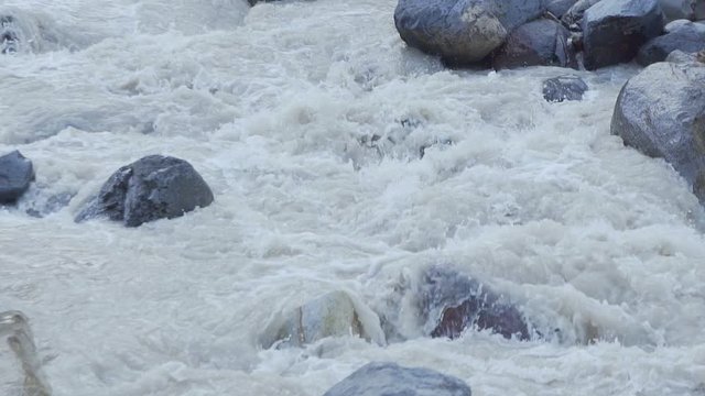 a rough mountain river among stones