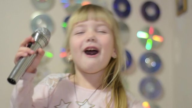 Girl speaking with microphone