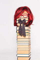 Education concept. Beauty Teacher Girl with Luxurious Red Hair