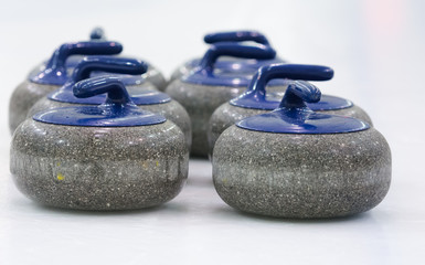 Fototapeta na wymiar Curling group blue stone.