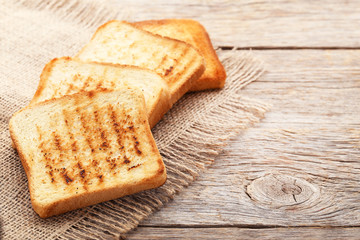 Toast bread on grey wooden table