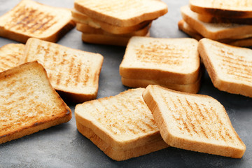 Toast bread on grey wooden table