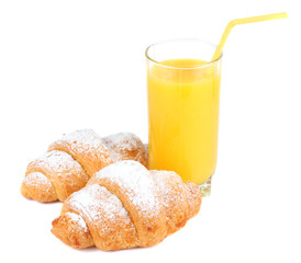 fresh croissant with juice in glass isolated on white background