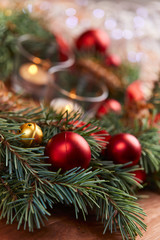Obraz na płótnie Canvas christmas wreath with red and golden balls