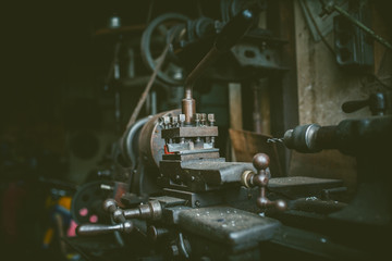 vintage turning machine in workshop