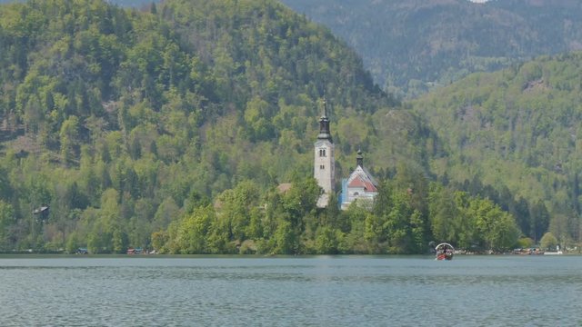 Bled Church 4K Hyperlapse. Ultra HD Scenic Slovenia Lake and Alps Landscape. Bled lake its castle and iconic island with church is a Slovenia Alps turistic place with terme and hotel. Bled 1 May 2017.