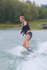 woman water skiing on a lake