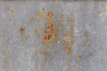gray plate with rust