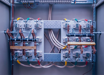 Wires and switches in electric box. Electrical panel with fuses and contactors