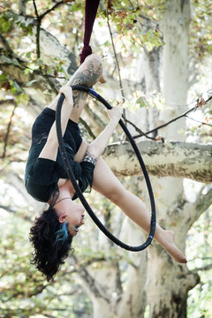 woman aerial hoop  dance in forest