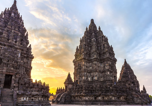 Monumental ancient architecture at beautiful sunset, carved stone walls. Candi Prambanan Hindu Temple, Yogyakarta, Jawa, Indonesia.