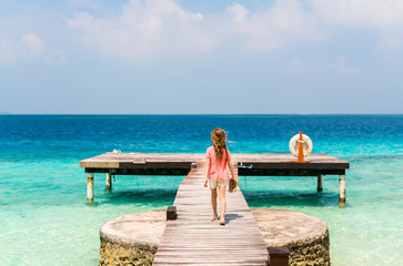 Adorable little girl at beach