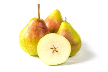 Pears on white background. Cut pear with core and seeds
