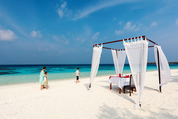 Mother and kids at tropical beach