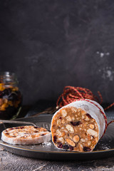 Panforte. Traditional italian christmas cake in dark style. Copy space.
