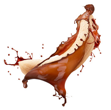 banana with chocolate splash isolated on a white background