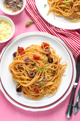 Pasta with tomatoes, olives, capers and anchovies Spaghetti alla puttanesca