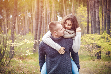 Happy young couple on nature. The concept of love. St. Valentine's Day.