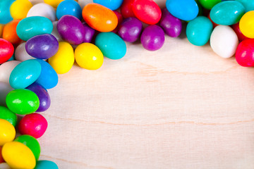 Fototapeta na wymiar frame from colorful sweets of sugar candies
