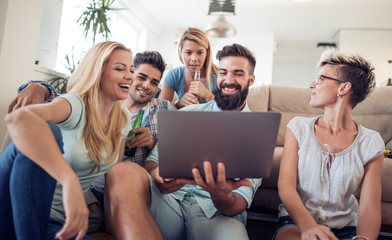 Group of friends watching sport together