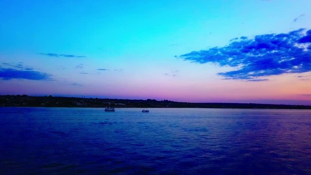 Slow aerial drone shot flying over Lake Paranoa at dusk ALTERNATIVE VERSION