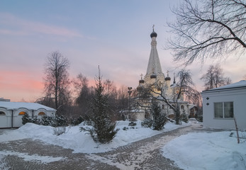 Ancient orthodox temple on a frosty evening at sunset. The Church of the Intercession of the Blessed Virgin Mary in Medvedkovo in Moscow
