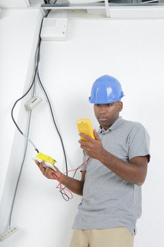 telecommunication technician checking the line