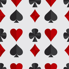 Vector illustration game background. Seamless pattern with playing card suits.