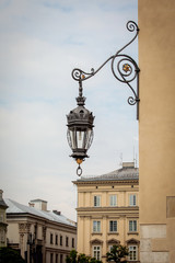 Fototapeta na wymiar Decorative lantern on the wall in Krakow