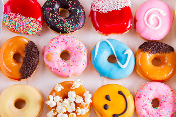 sweet doughnuts pastry in box, top view scene