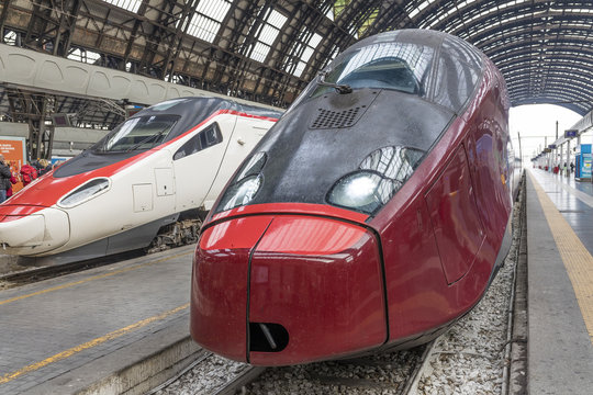 Fototapeta Two high-speed train at the railway station in Milano - Italy