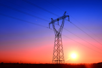 High piezoelectric towers, in the setting sun