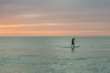Silhouette of a standup paddler on Kauai, Hawaii - 180510426