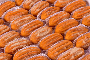 Churro with sugar and cinnamon on top