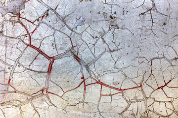 Beautiful old wall with large cracks and texture. Creative fashion basis for background for aging,...