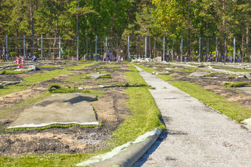 Replacement of artificial turf on the sports field.
