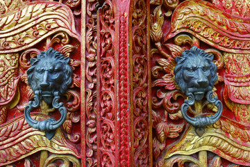 door handle with lion design on buddhist temple