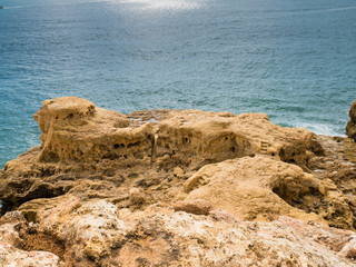 Sandcastle formation on the coast of Carvoeiro