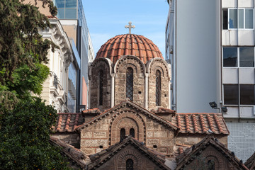 Obraz premium Panaghia Kapnikarea church on Ermou Street in Athens, Greece. It is one of the most iconic landmarks of the Greek Orthodox Church in the center of the Greek capital city.