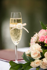 Wedding. Champagne glass and flowers for wedding ceremony