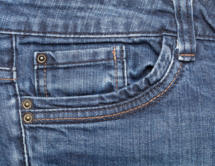 Blue denim jeans pocket close up