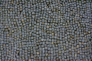 Photo of a platform made of paving stones of a square shape. Top view